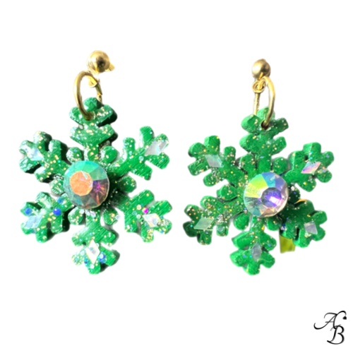 Boucles d’oreilles clous Flocon d’hiver en bois doré mordoré avec cristaux rouges et attaches en argent 925 – création artisanale Aline B Création.
