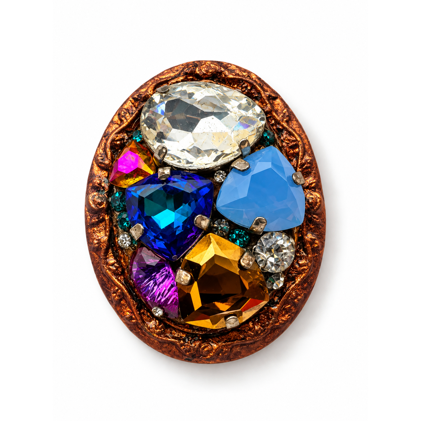 Broche Trésor stellaire de face : ovale en laiton cuivré constellé de cristaux colorés – Aline B Création